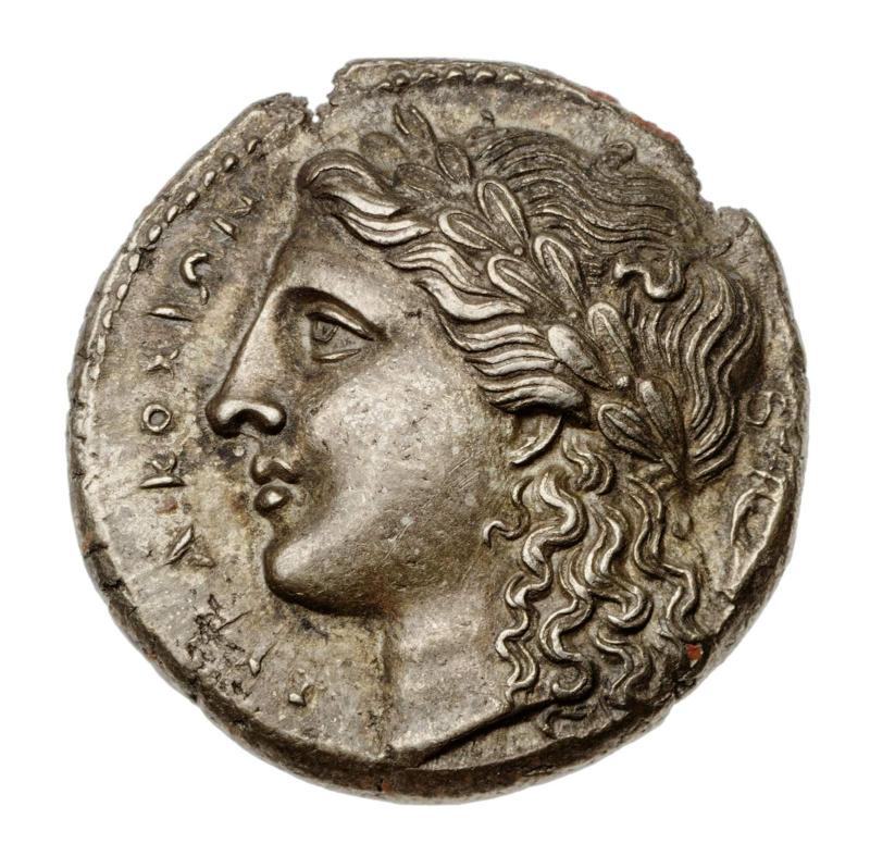 100 litra-piece of Syracuse with head of Apollo, struck under Dionysios I and II