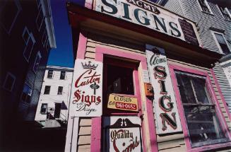 Providence (pink-edged doorway and signs, Acme Sign shop)