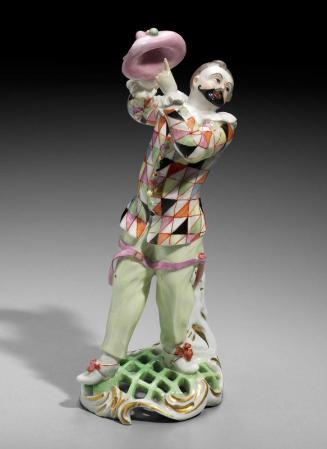 Figure of a dancing Harlequin