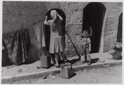 Hanging clothes out to dry before the cease-fire