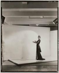 Model on Set with Hands Together