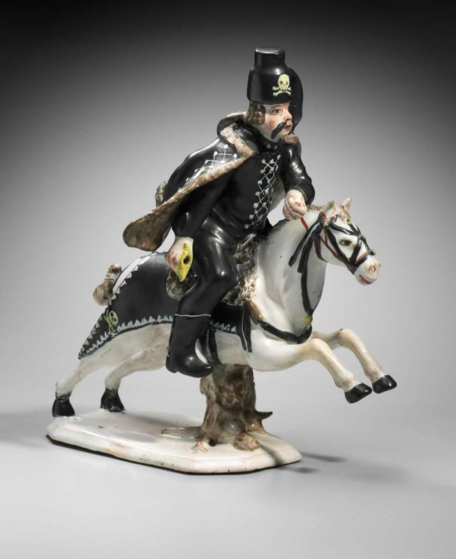 Figure of a galloping Hussar