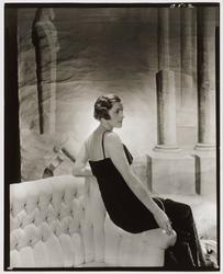 Model in Black Strapless Dress