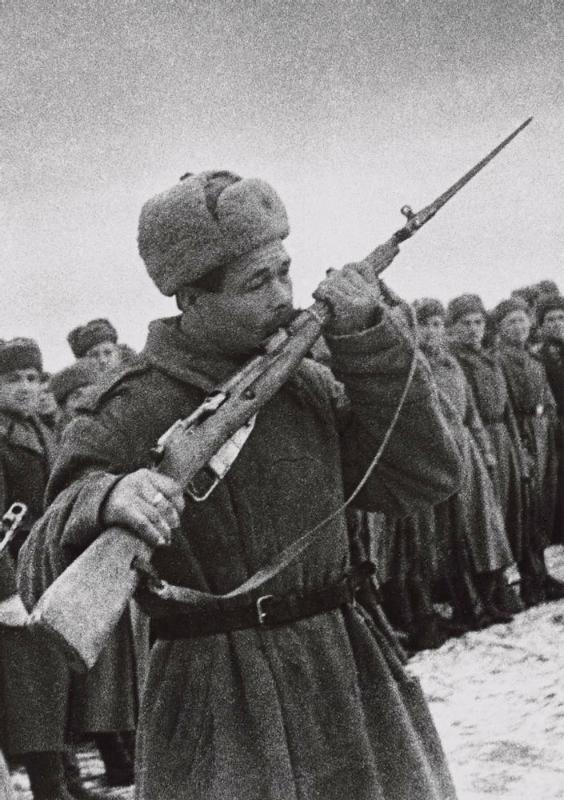 The Oath of War (Soviet soldier kissing his rifle)
