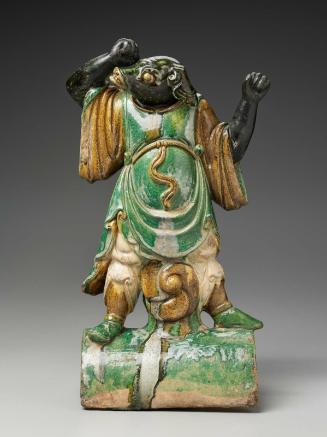 Roof tile with standing figure of Pig decorated with liuli glaze
