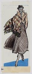 Female model in short tweed jacket over wool skirt with plaid shawl