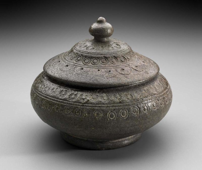 Burial urns with stamped decoration