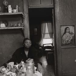 Untitled, [Old Woman with Madonna on the Wall], from East 100th Street series