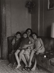 Untitled, [Mother and Three Children Sitting on Couch], from East 100th Street series