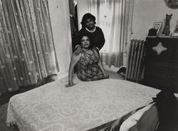 Untitled, [Mother and Daughter Posing on Bed], from East 100th Street series