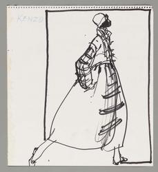 Female model walking while wearing a big coat by Kenzo