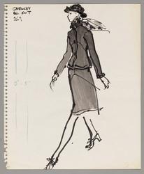 Female model in blue suit with scarf,