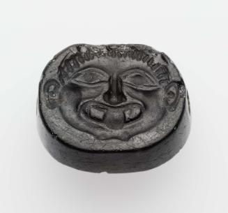 Scaraboid gem with a gorgon's head