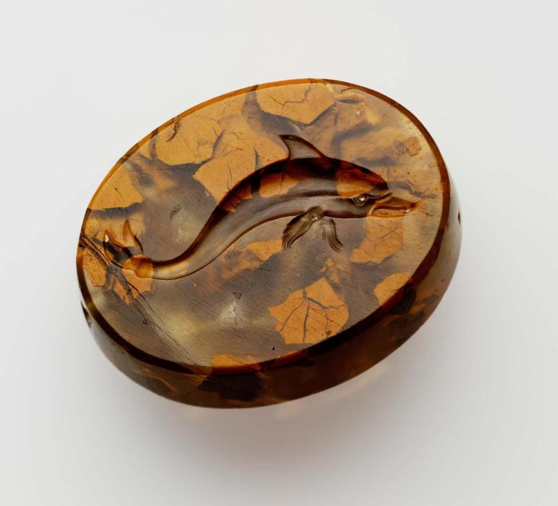 Scaraboid gem with a dolphin