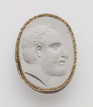 Scaraboid gem with a head of a bearded man