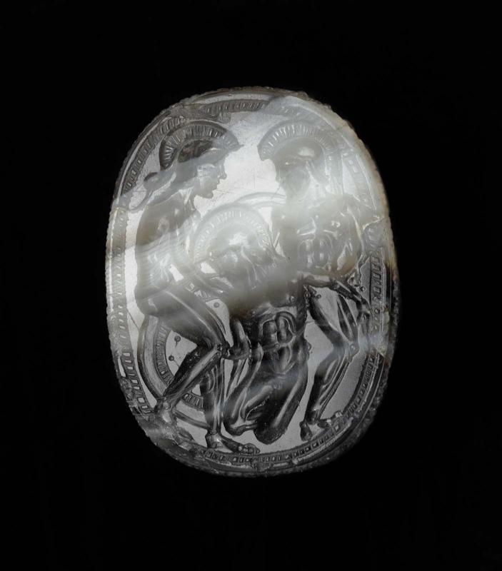 Scarab with two warriors supporting a wounded comrade