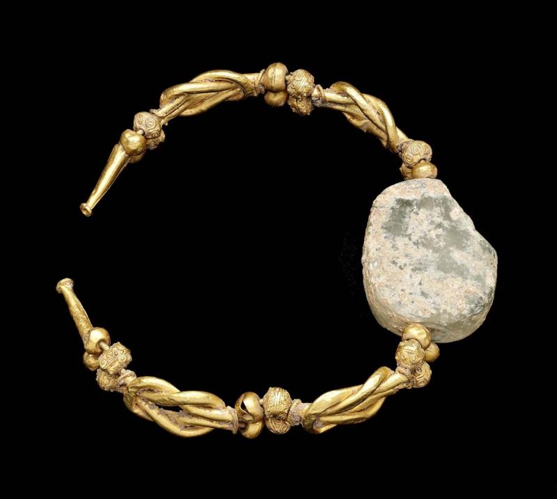Bracelet with engraved gem depicting a female head wearing earrings and a necklace
