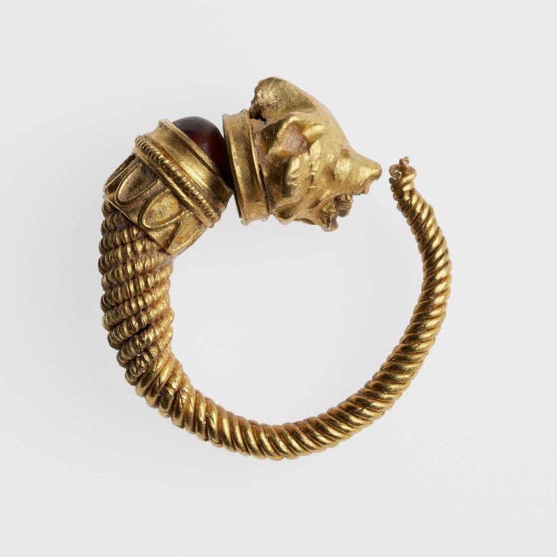 Hoop earring with dog's head terminal