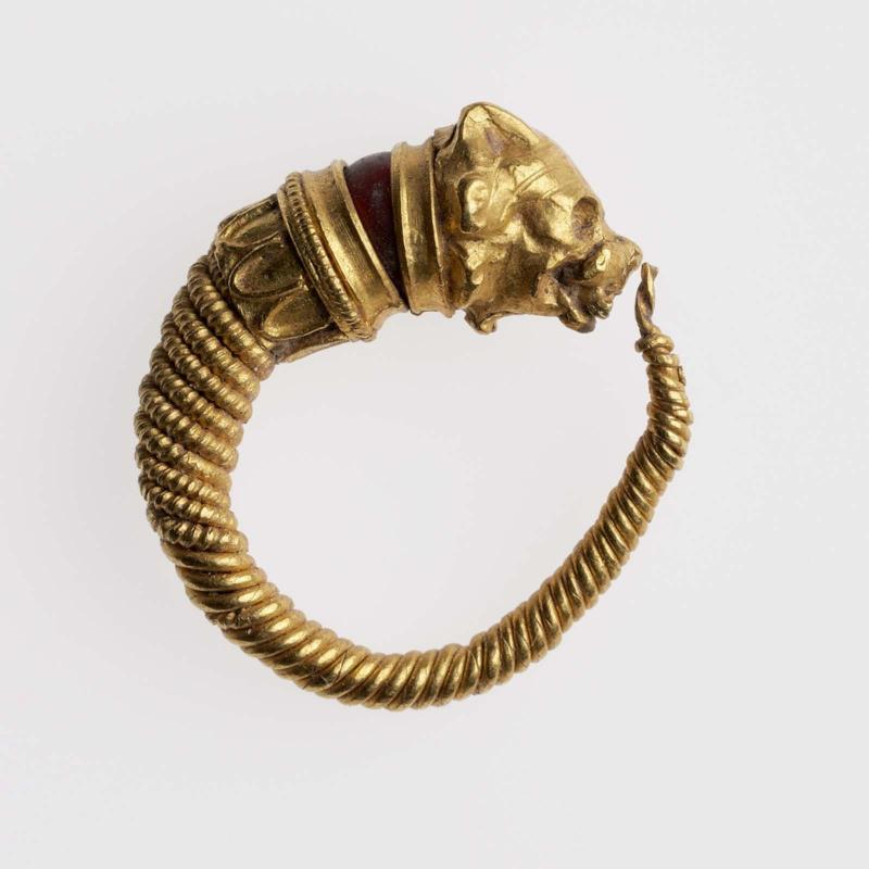Hoop earring with dog's head terminal