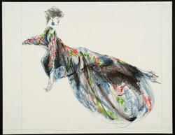 Female model posed lying down in a shimmering silk caftan