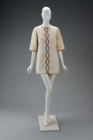 Woman's ensemble in two parts (swimsuit and cover-up)