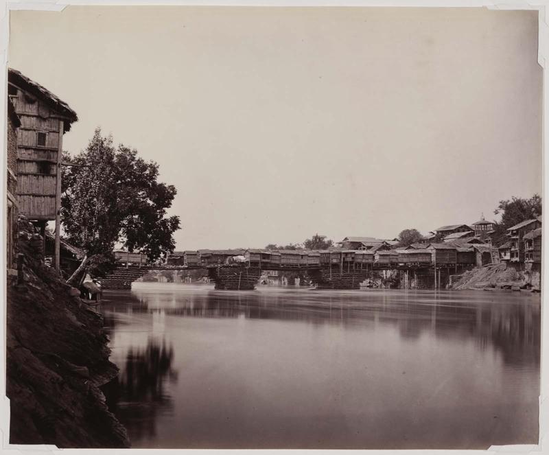 Riverbank with Humble Dwellings