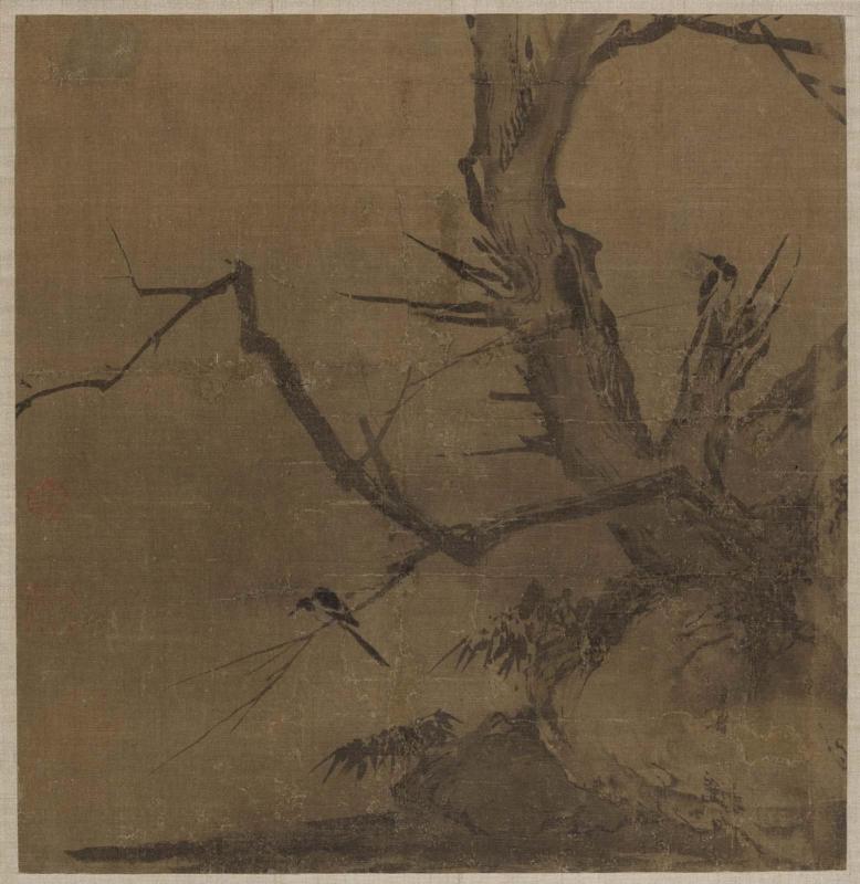 Two birds in a wintry landscape