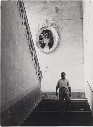 Man Walking Down Staircase
