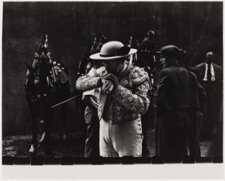 Bullfighter Inspecting his Arm