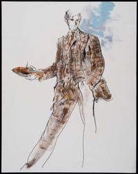 Male model in plaid suit holding shoe 