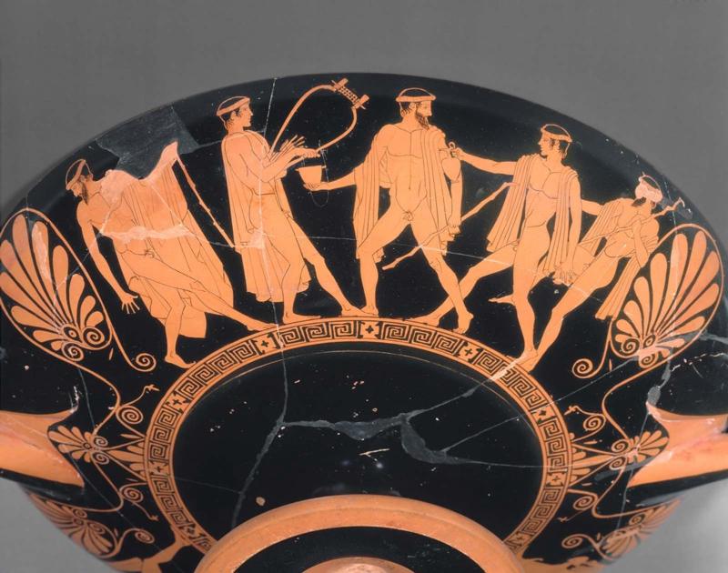 Drinking cup (kylix) with symposium and komos scenes