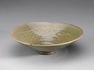 Bowl with carved and incised floral design