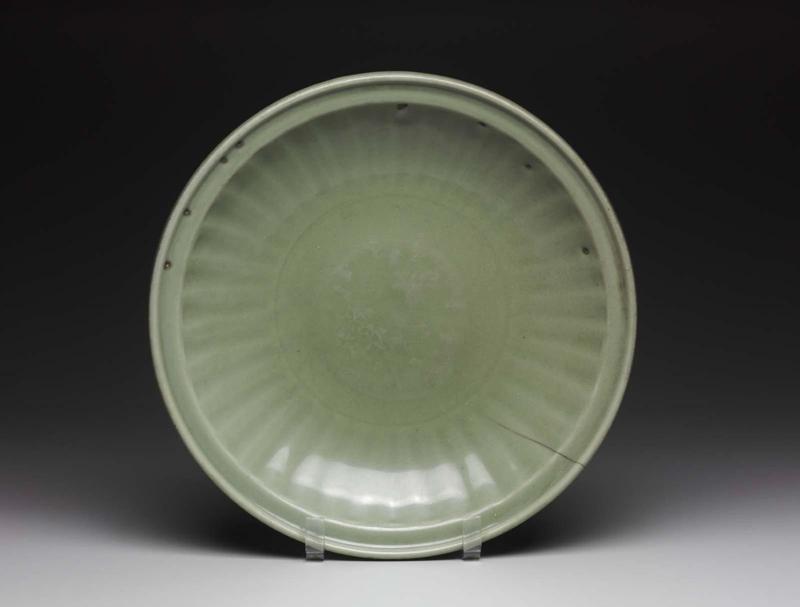 Large plate with molded design of lotus flowers