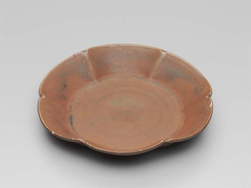 Plate of six-lobed foliate form with russet glaze
