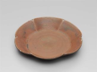 Plate of six-lobed foliate form with russet glaze