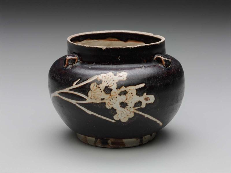 Jar with papercut resist decoration with four looped handles