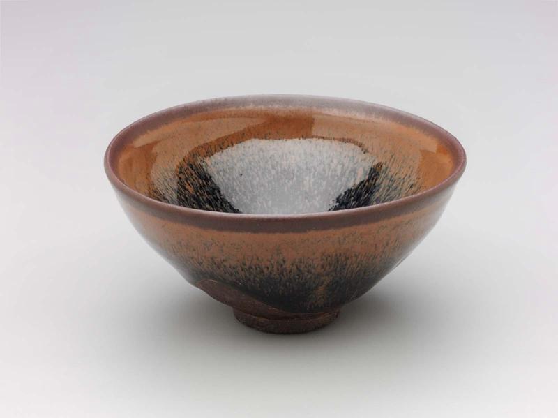 Tea bowl with hare's fur glaze and russet glazed rim