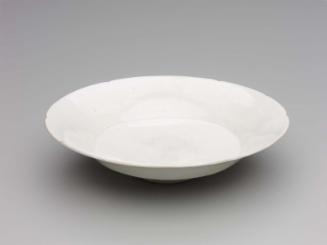 Shallow dish with foliated rim