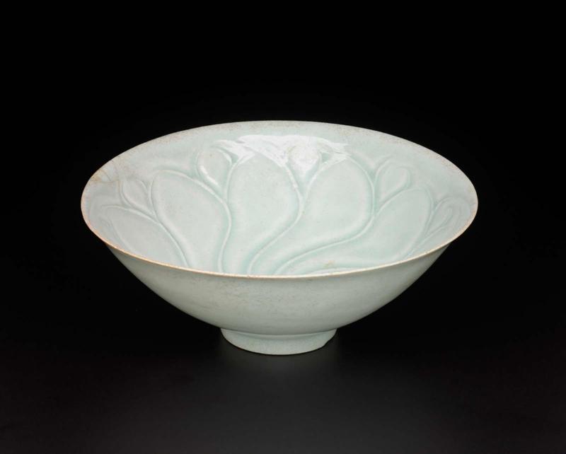 Bowl with carved floral design under qingbai glaze