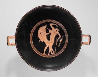 Drinking cup (kylix) with drunken revelers