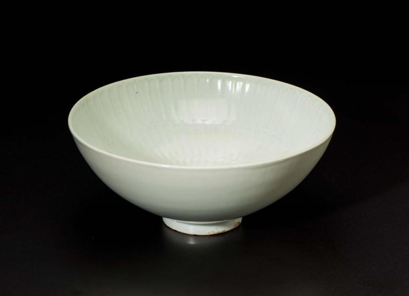 Large bowl with molded chrysanthemum design on interior