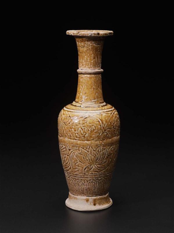 Molded bottle with pale brown glaze