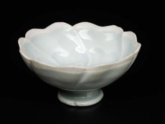 Cup in the form of a mallow flower
