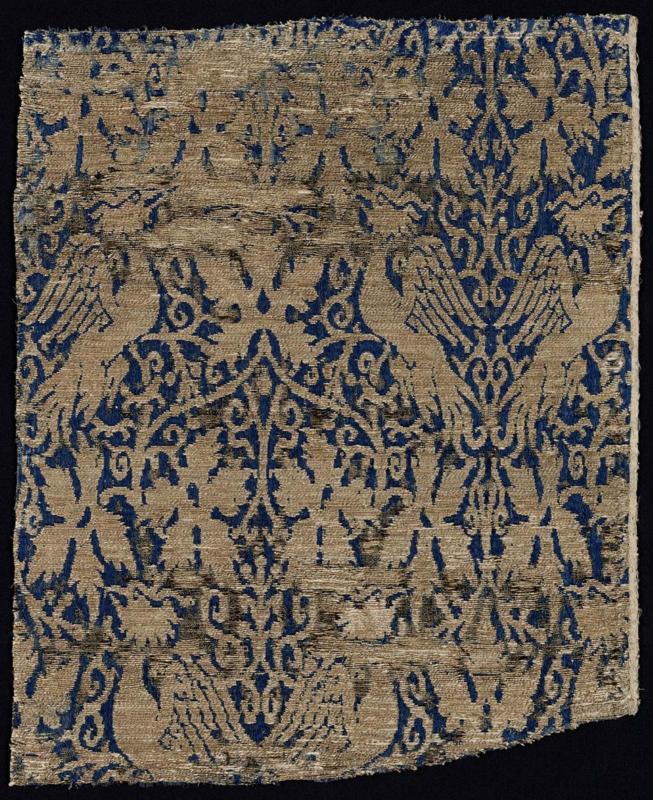 Fragment with paired phoenixes in vines