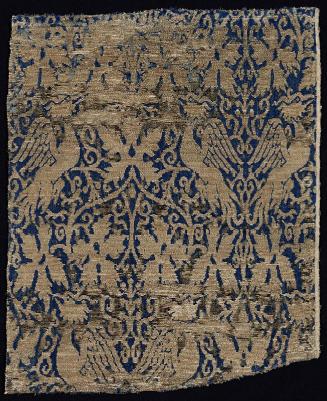 Fragment with paired phoenixes in vines