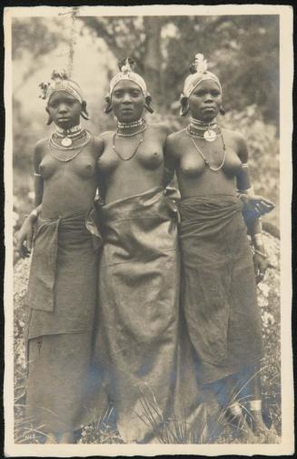 Full length portrait of three women