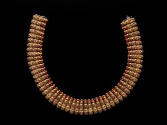 Necklace with human and ram's head pendants