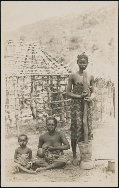 Woman standing with a mortar and pestle, mother sitting and feeding her child, and another child sitting