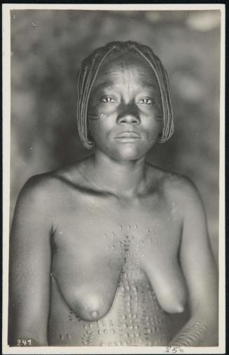 Half-length portrait of a woman with body scars