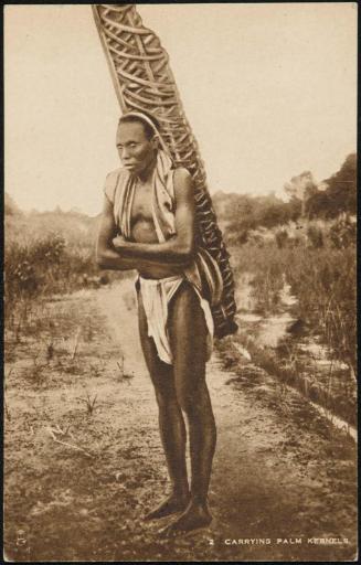 CARRYING PALM KERNELS.